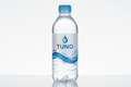Tuno bottled spring water with blue cap and label